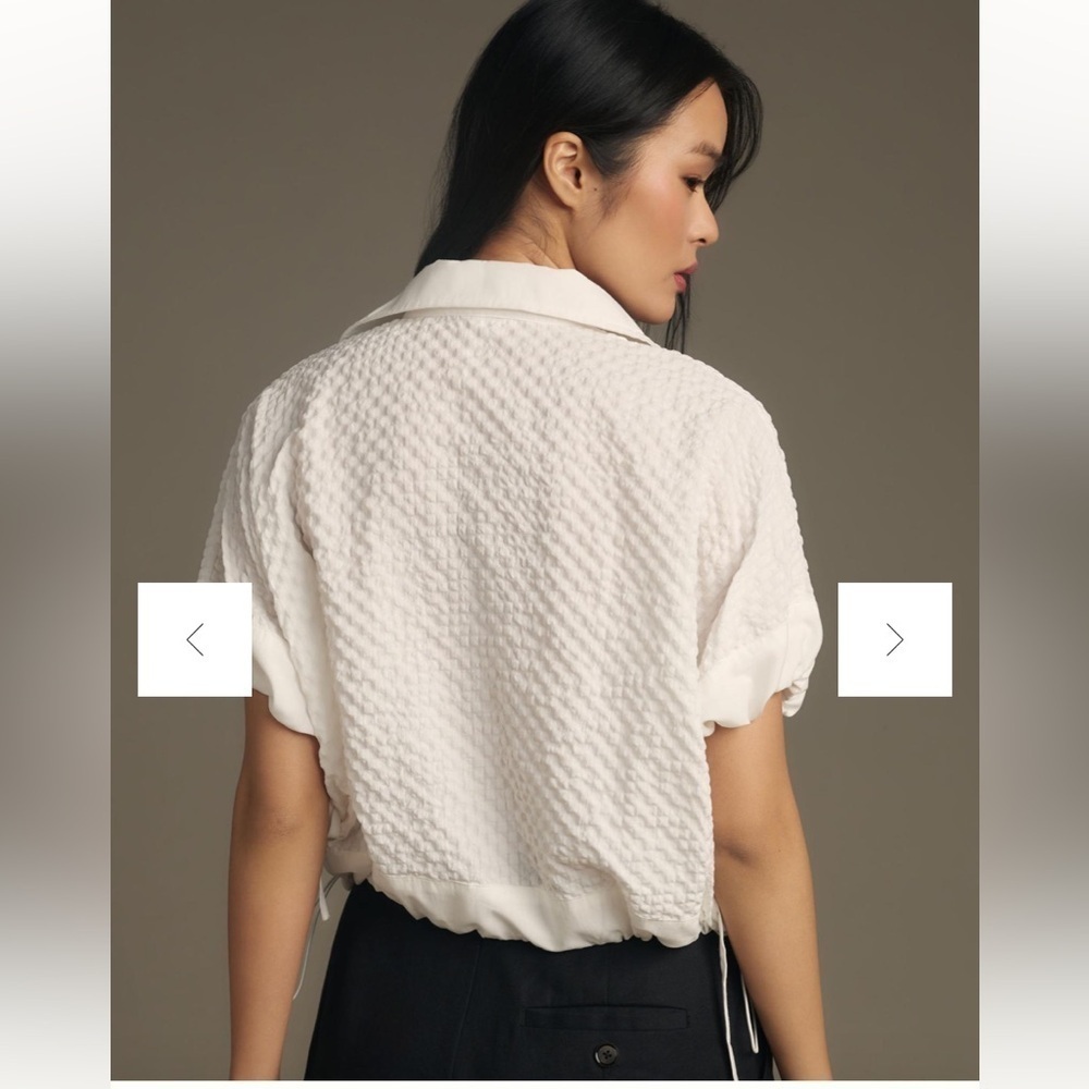 Self Contrast white bubble fabric pullover top. Button front. Size S